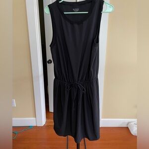 Black athleta athletic dress with cinch waist.